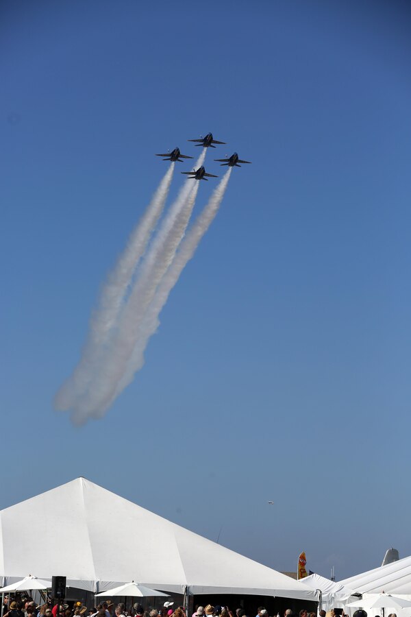 Four U.S. Navy Blue Angels perform an aerobatic maneuver during the 2015 MCAS Miramar Air Show aboard Marine Corps Air Station Miramar, California, Oct. 3. The Blue Angels’ show includes various F/A-18 Hornet formations and a solo flight by the C-130T Hercules called “Fat Albert.” (U.S. Marine Corps photo by Sgt. Melissa Wenger/Released)
