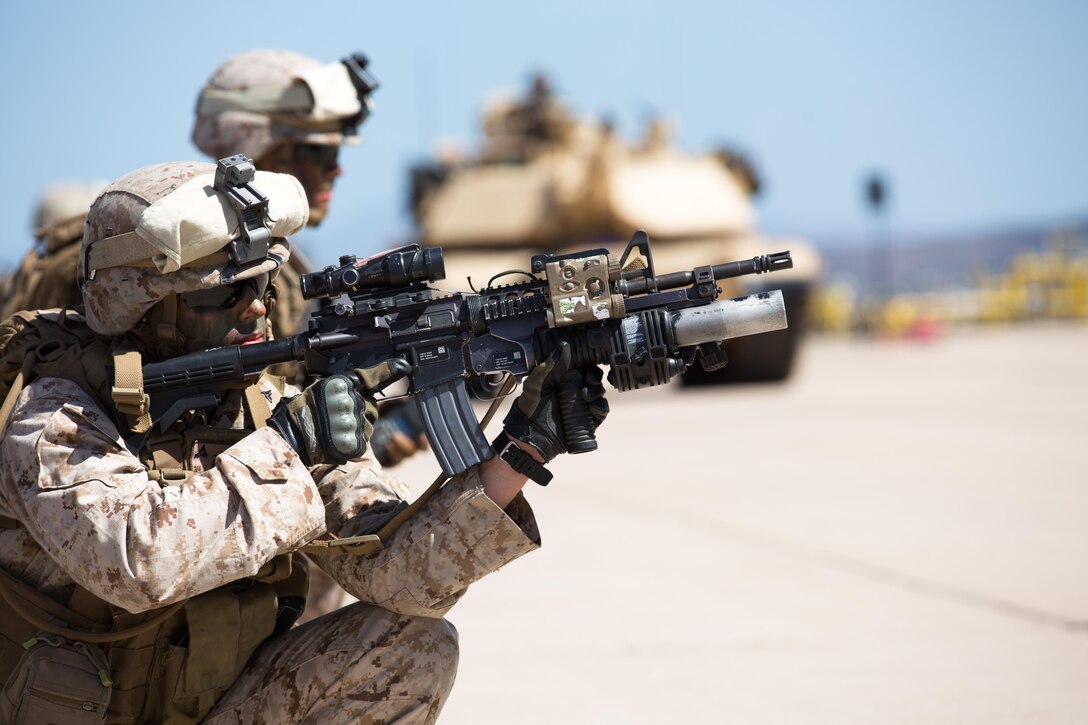 Marines post security during the 2015 MCAS Miramar Air Show’s Marine Air-Ground Task Force demonstration aboard Marine Corps Air Station Miramar, Calif., Oct. 2. The MAGTF demonstrated the capabilities of several air and ground Marine Corps assets. (U.S. Marine Corps photo by Sgt. Michele Hunt/Released)