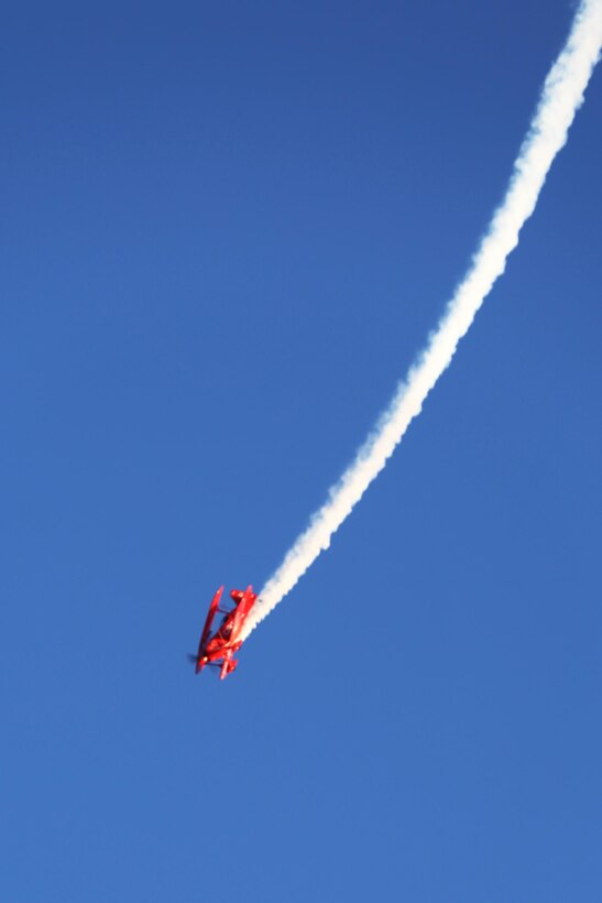 Sean D. Tucker, the Oracle Challenger pilot, performs nose dives for one of his aerial maneuvers during the 2015 MCAS Miramar Air Show aboard Marine Corps Air Station Miramar, California, Oct. 3. The Oracle Challenger was one of many aerial performances scheduled during the air show. (U.S. Marine Corps photo by Sgt. Michele Hunt/Released)