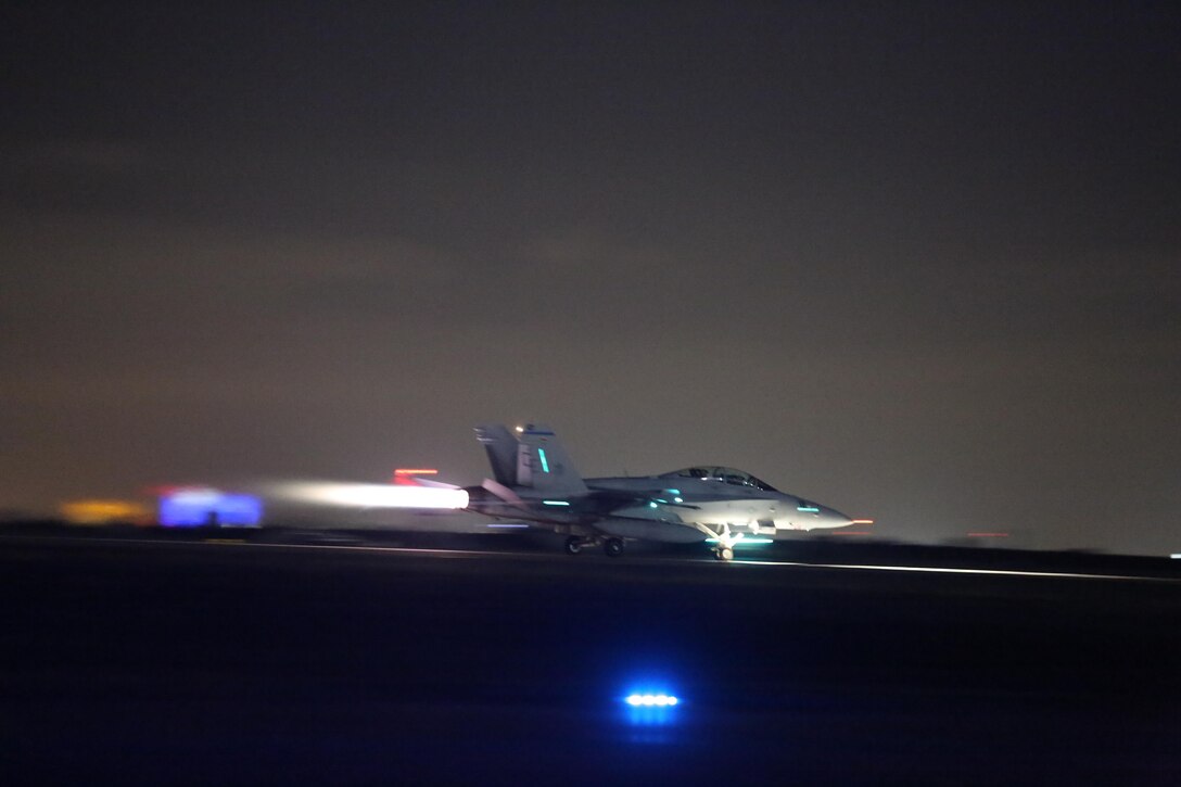 An F/A-18 Hornet illuminates the flight line during the 2015 MCAS Miramar Air Show’s Twilight Show aboard Marine Corps Air Station Miramar, Calif., Oct. 3. The Twilight Show consists of a few of the day’s favorite acts and ends with the "Great Wall of Fire." (U.S. Marine Corps photo by Lance Cpl. Kimberlyn Adams/Released)