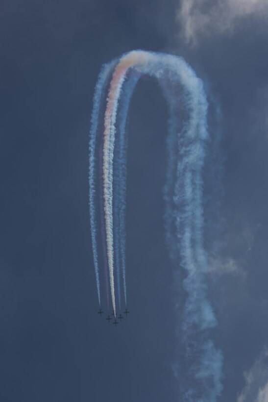 The Patriots L-39 Jet Team creates colorful patterns using their smoke trails during their performance at the 2015 MCAS Miramar Air Show aboard Marine Corps Air Station Miramar, California, Oct. 3. The Patriots Jet Team demonstrated their expertise to spectators with fast-paced flying formations and their signature “Tail Slide” maneuver. (U.S. photo by Sgt. Lillian Stephens/Released)