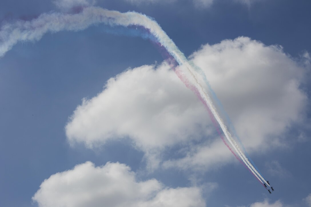 The Patriots L-39 Jet Team creates colorful patterns using their smoke trails during their performance at the 2015 MCAS Miramar Air Show aboard Marine Corps Air Station Miramar, California, Oct. 3. The Patriots Jet Team demonstrated their expertise to spectators with fast-paced flying formations and their signature “Tail Slide” maneuver. (U.S. photo by Sgt. Lillian Stephens/Released)