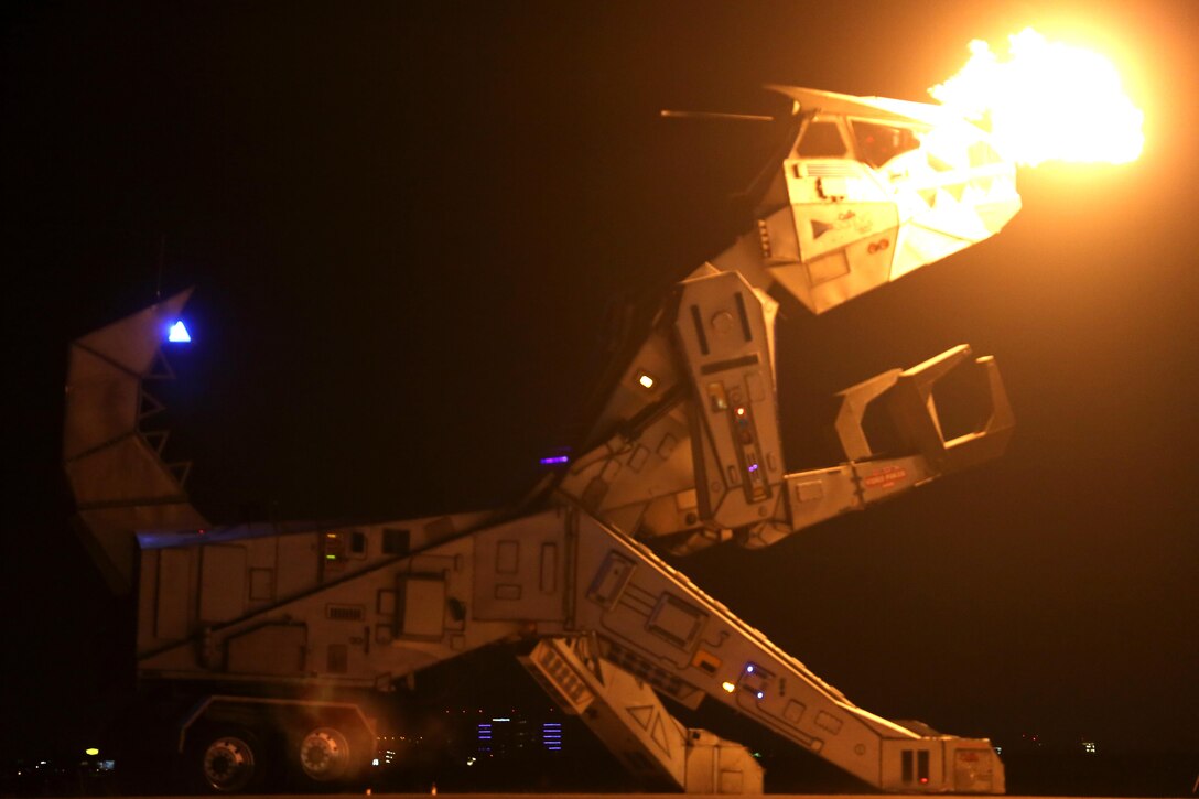 Robosaurus makes his way to dinner during its performance at the 2015 MCAS Miramar Air Show aboard Marine Corps Air Station Miramar, California, Oct. 3. Robosaurus transforms from a semi-truck to a 30-ton, 40-foot tall metal T-Rex. (U.S. Marine Corps photo by Sgt. Michele Hunt/Released)