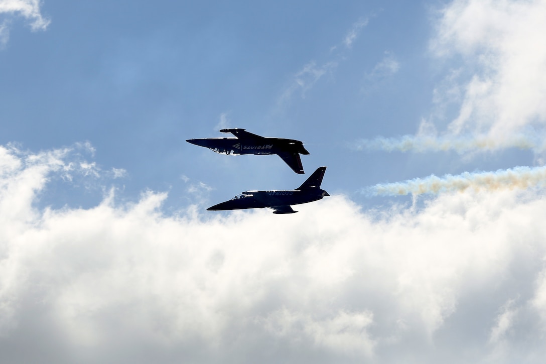 The Patriots Jet Team performs during the 2015 MCAS Miramar Air Show aboard Marine Corps Air Station Miramar, Calif., Oct. 2. The Patriots are a civilian performance team made up of L-39 Albatros jets modified for use in the air show circuit. (U.S. Marine Corps photo by Cpl. Shaltiel Dominguez/Released)