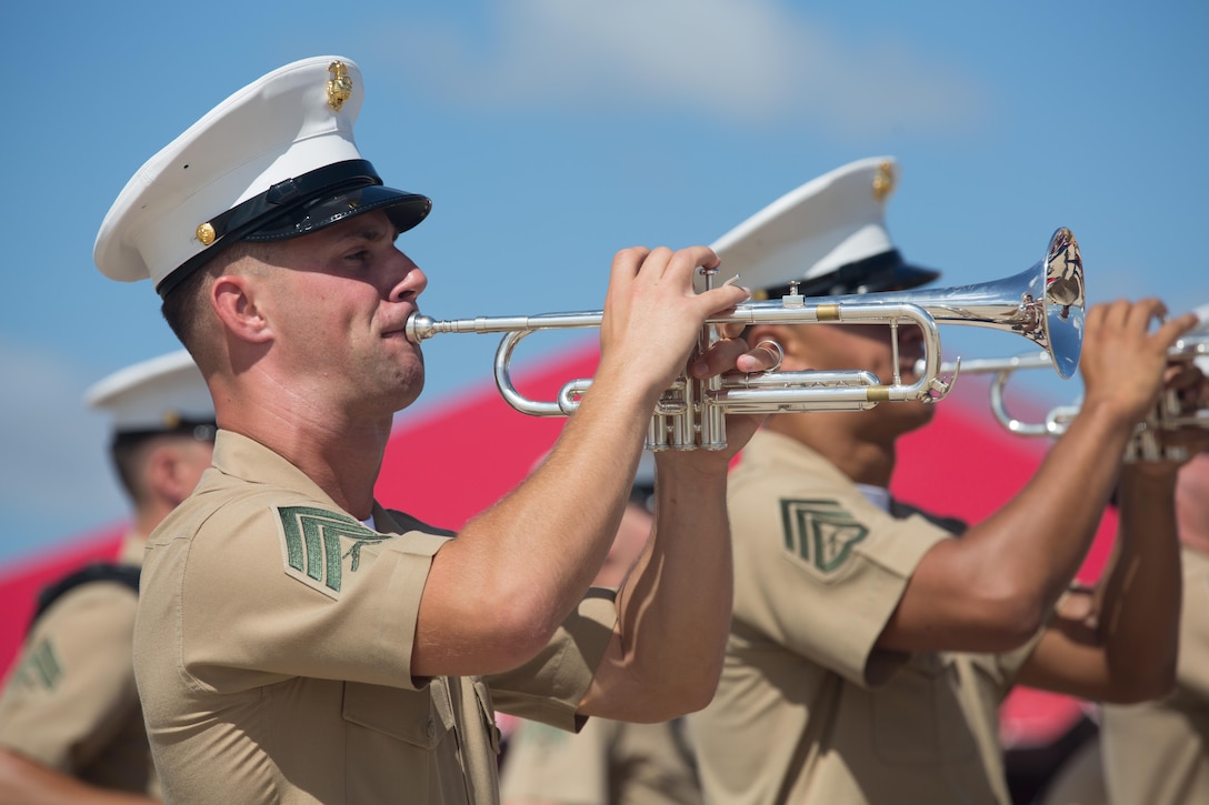 The 3rd Marine Aircraft Wing Band performs during the opening ceremony of the 2015 MCAS Miramar Air Show aboard Marine Corps Air Station Miramar, Calif., Oct. 2. Demonstrations and static displays followed the kick-off ceremony for the world’s largest military air show. (U.S. Marine Corps photo by Sgt. Michele Hunt/Released)