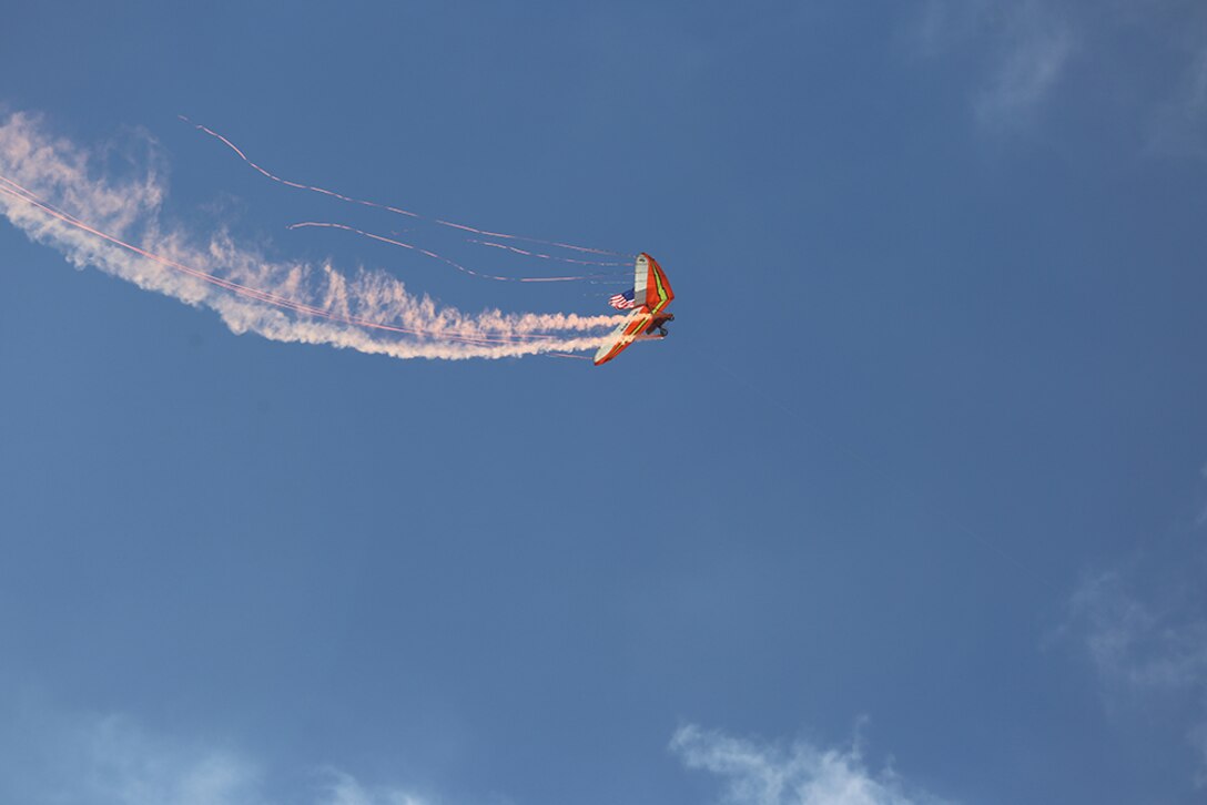 Dan Buchanan, a featured performer of the 2015 MCAS Miramar Air Show, pilots a hang glider aboard Marine Corps Air Station Miramar, Calif., Oct. 2. Buchanan uses a powerless hang glider and a motorized wing during his performances. (U.S. Marine Corps photo by Sgt. Melissa Wenger/Released)