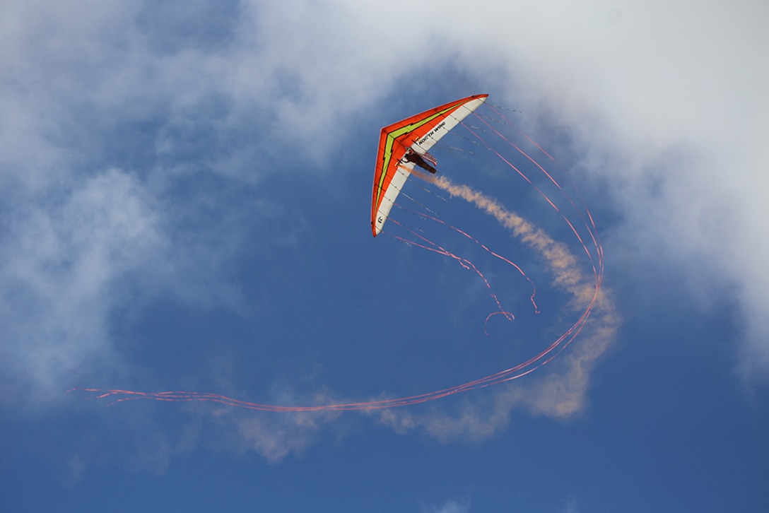 Dan Buchanan pilots a hang glider as part of his performance during the 2015 MCAS Miramar Air Show aboard Marine Corps Air Station Miramar, Calif., Oct. 2. Despite suffering a spinal injury and becoming a paraplegic, Buchanan flies the glider with lighted wings at heights upward of 17,000 feet. (U.S. Marine Corps photo by Sgt. Melissa Wenger/Released)