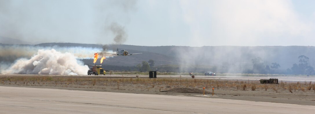 The Shockwave Jet Truck prepares to race an AT-6 Wardog during the 2015 MCAS Miramar Air Show aboard Marine Corps Air Station Miramar, California, Oct. 2. The theme of this year’s air show is “A Salute to Veterans and their Families.” (U.S. Marine Corps photo by Sgt. Lillian Stephens/Released)