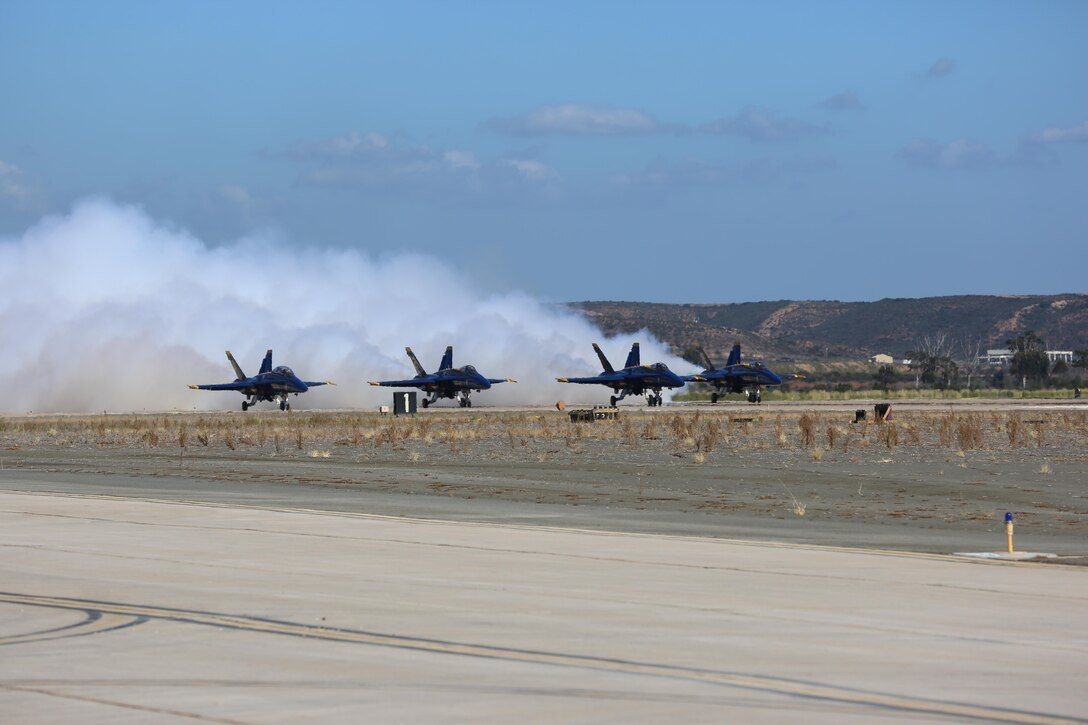 The U.S. Navy Blue Angels begin to take off during the 2015 MCAS Miramar Air Show aboard Marine Corps Air Station Miramar, Calif., Oct. 2. The Blue Angels show audiences around the world the capabilities of the armed forces’ aircraft. (U.S. Marine Corps photo by Lance Cpl. Kimberlyn Adams/Released)