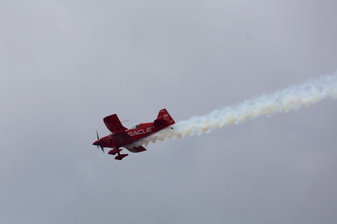 Sean D. Tucker, Oracle Challenger pilot, glides just above the runway on the final day of the 2015 MCAS Miramar Air Show aboard Marine Corps Air Station Miramar, Calif., Oct. 4. The Oracle Challenger is the opening act on each day of the air show. (U.S. Marine Corps photo by Sgt. Michele Hunt/Released)