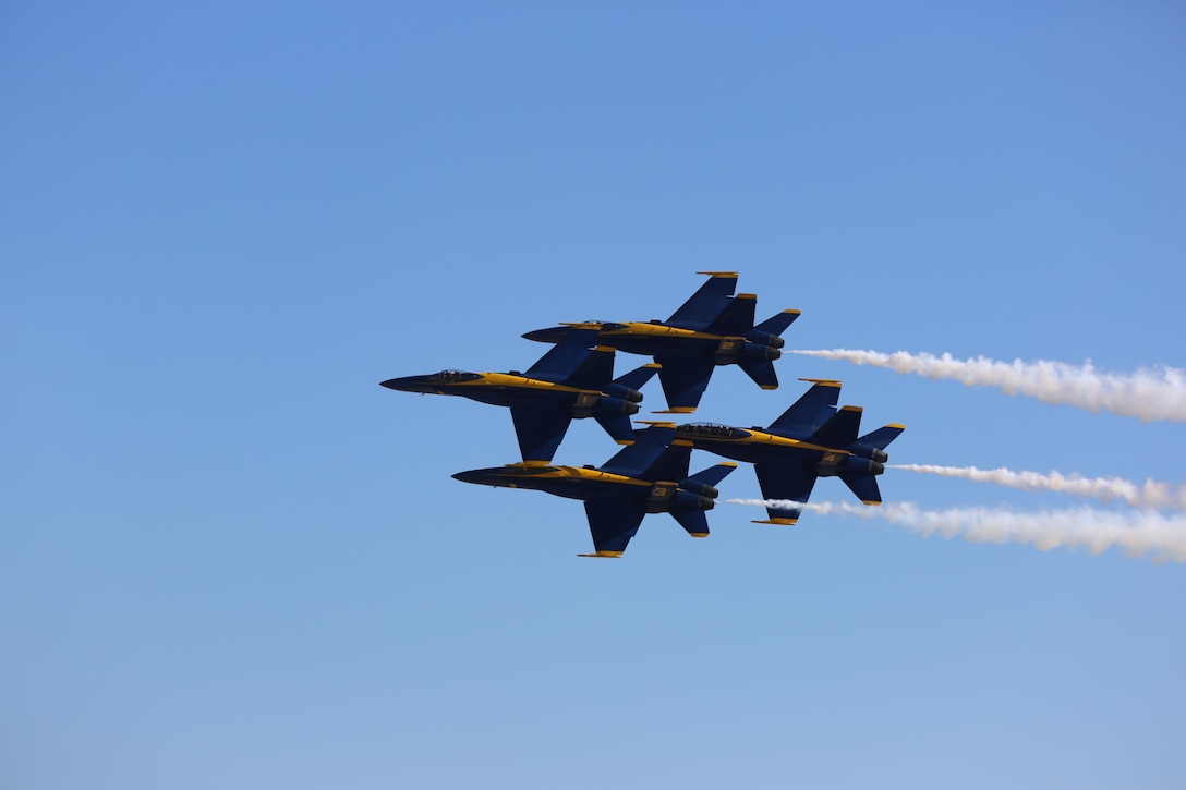 U.S. Navy Blue Angels perform at the 2015 MCAS Miramar Air Show aboard Marine Corps Air Station Miramar, California, Oct. 2. Sixteen pilots volunteer to fly in the formation of F/A-18 Hornets to show audiences around the world the capabilities of the armed forces’ aircraft. (U.S. Marine Corps photo by Lance Cpl. Kimberlyn Adams/Released)