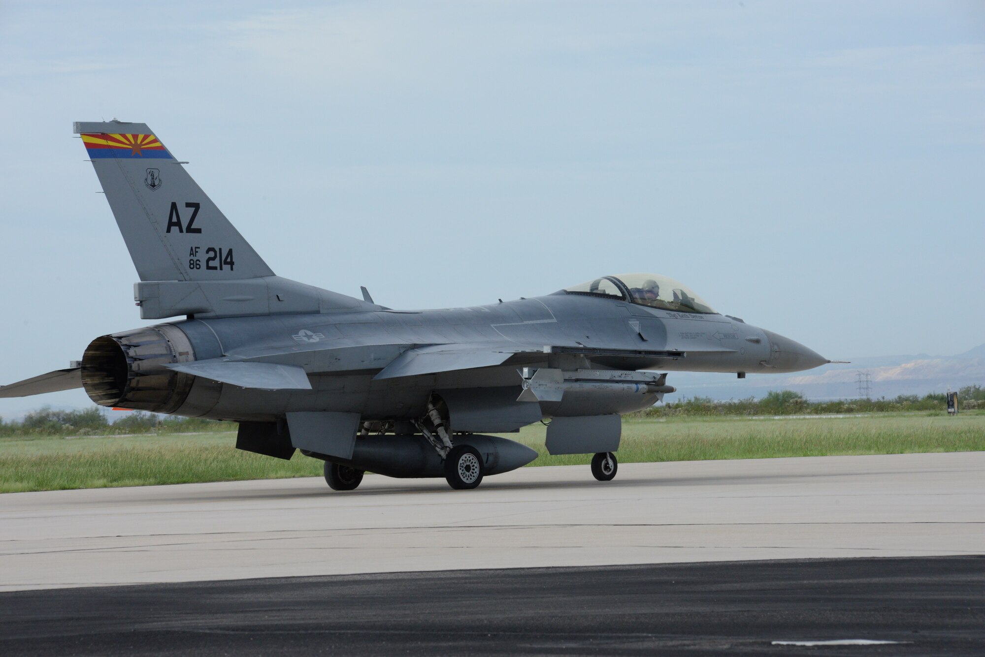 An F-16 from the Aerospace Control Alert Detachment from the 162nd Wing taxis down a runway at Davis-Monthan Air Force Base in Tucson, Arizona, Sept. 12, 2015. The detachment maintains the ability to quickly scramble in response to airborne threats in the Southwest United States, as well as proactively defend large gatherings and high profile events. (Air National Guard photo by Senior Airman Jackson Hurd)
