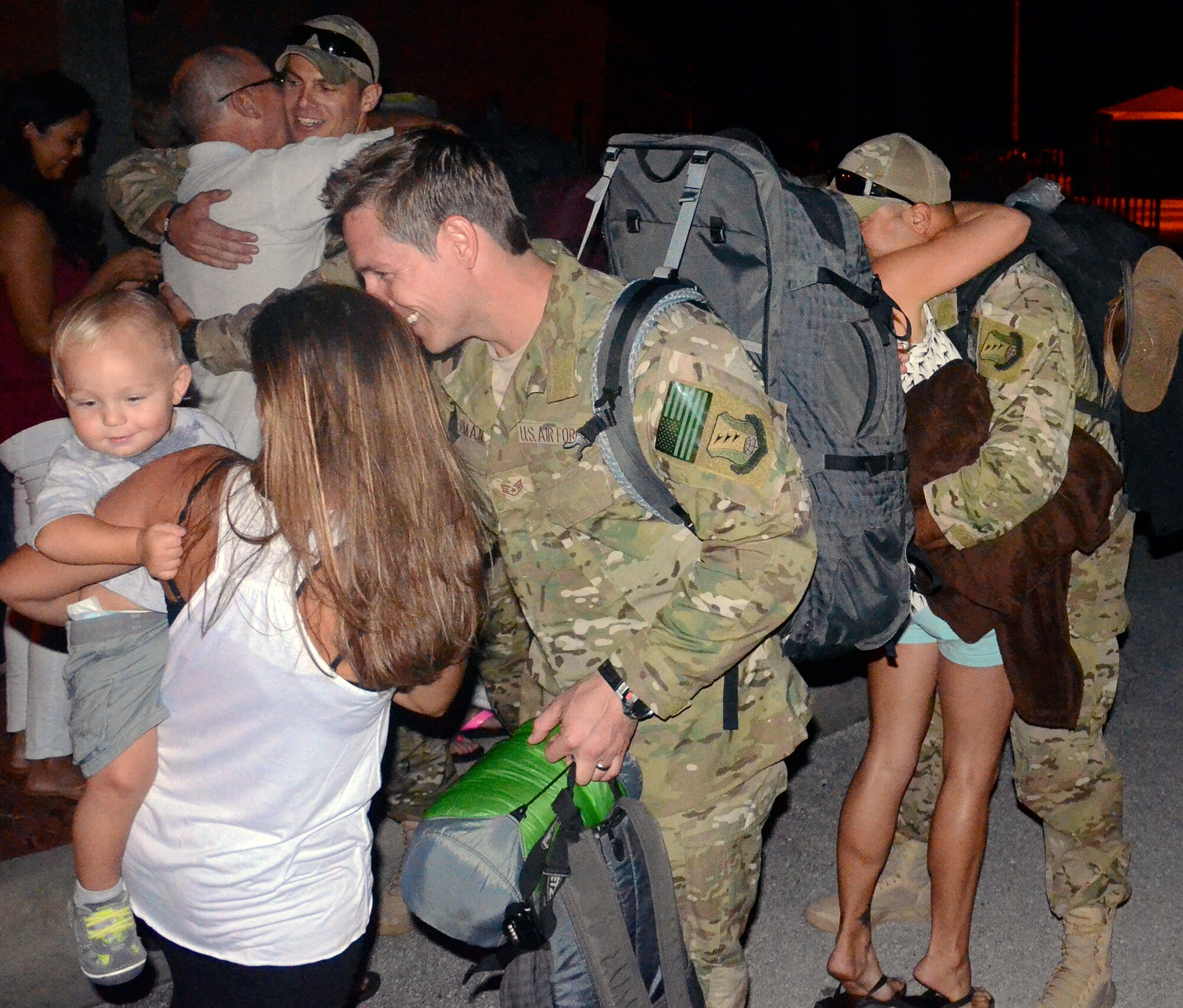 PATRICK AIR FORCE BASE, Fla. -  A group of reservists from the 920th Rescue Wing here are welcomed home by family and friends after returning from a deployment to the Horn of Africa. Roughly 30 pararescuemen and support personnel deployed four months ago to Northeast Africa to serve as part of Combined Joint Task Force - Horn of Africa, where they provided personnel recovery and humanitarian aid as neccessary. (U.S. Air Force photo/Master Sgt. Paul Flipse)