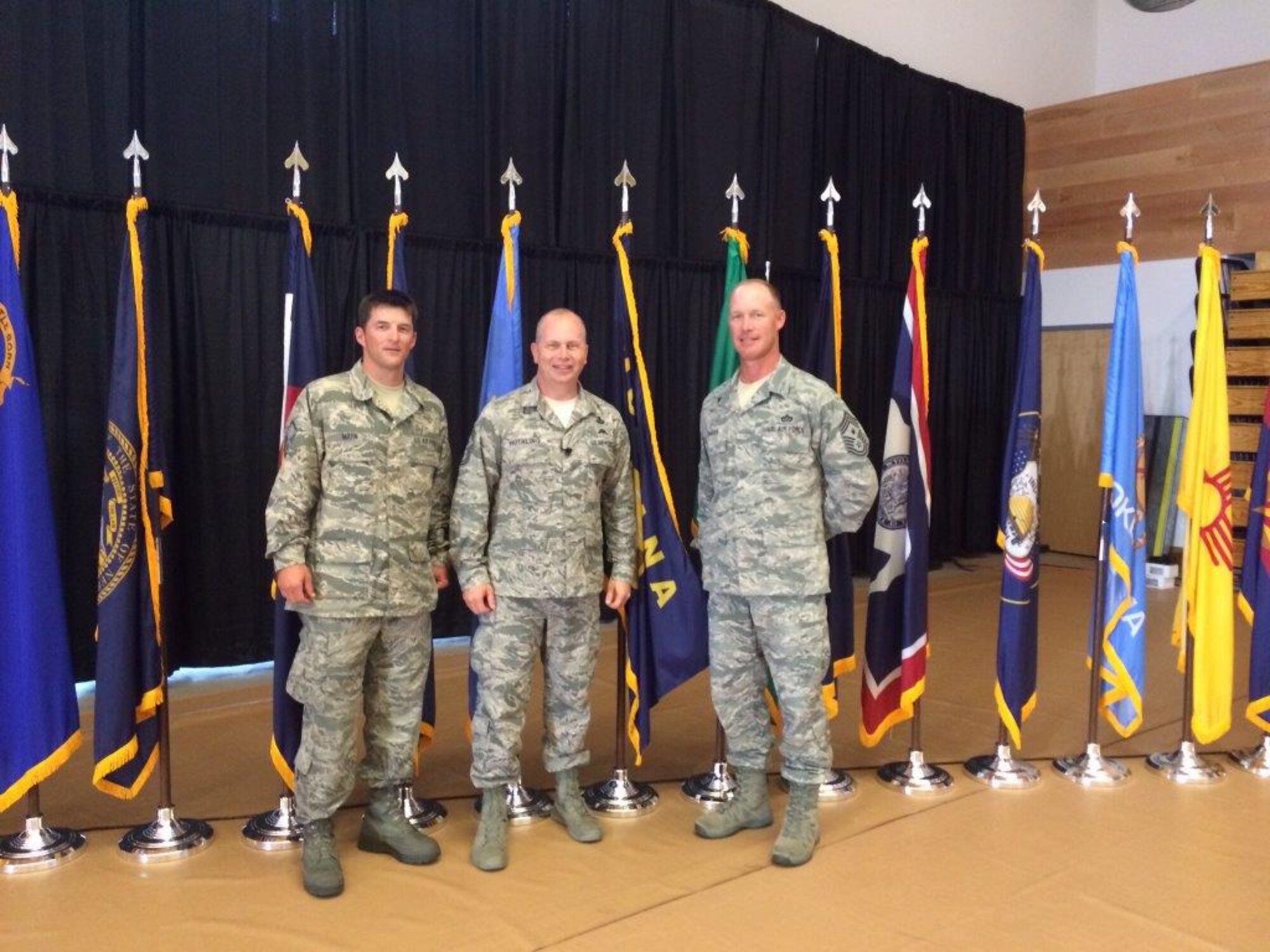 Master Sgt. Jeremy Marn, 120th Airlift Wing crew chief, left, poses for a photo with Command Chief Master Sgt. for the Air National Guard, Chief Master Sgt. James Hotaling, center, and Command Chief Master Sgt. for the Montana Air National Guard, Chief Master Sgt. Tim Zumbrun, at the ANG Enlisted Leadership Symposium held at Camp Dawson, West Virginia, Aug. 26-28. (Courtesy photo) 
