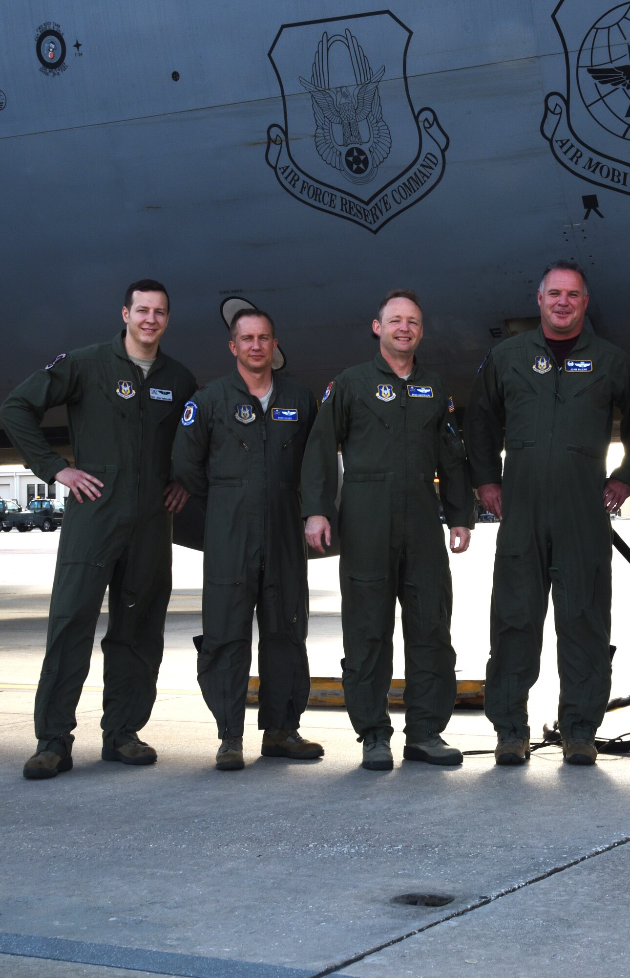 Col. Brad Anderson, poses with the air crew before his final flight as the 927th Air Refueling Wing vice commander, Saturday, October 3, 2015. The “fini flight” allow pilots an opportunity to fly one more time with crew members and watch the mission being done. (U.S. Air Force Photo by Staff Sgt. Adam C. Borgman)