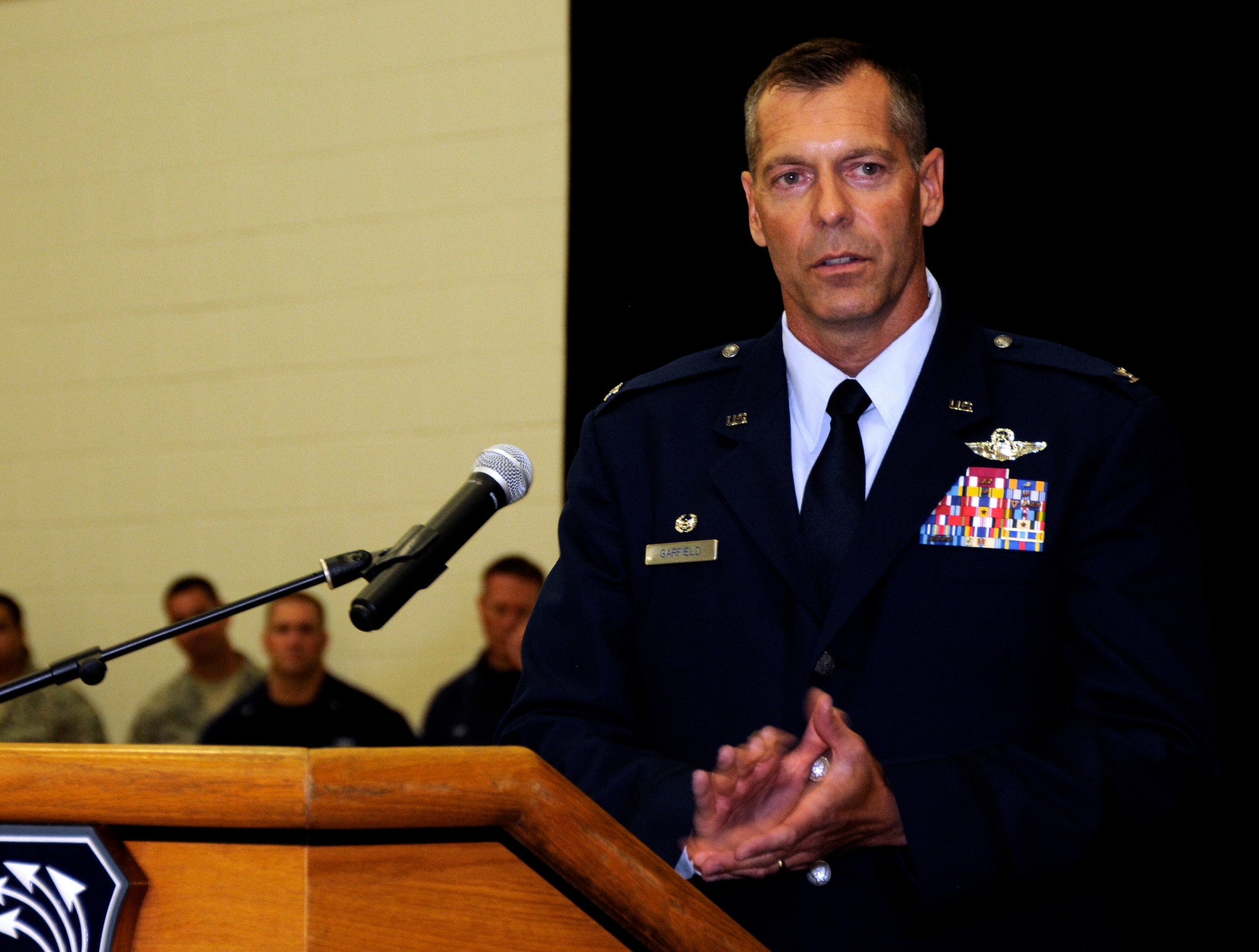 Col. David P. Garfield, the 482nd Fighter Wing commander, addresses members of Team Homestead for the first time as their new commander during a change-of-command ceremony in Building 471, at Homestead Air Reserve Base, Florida, Sept. 13.  (U.S. Air Force photo by Senior Airman Frank Casciotta)