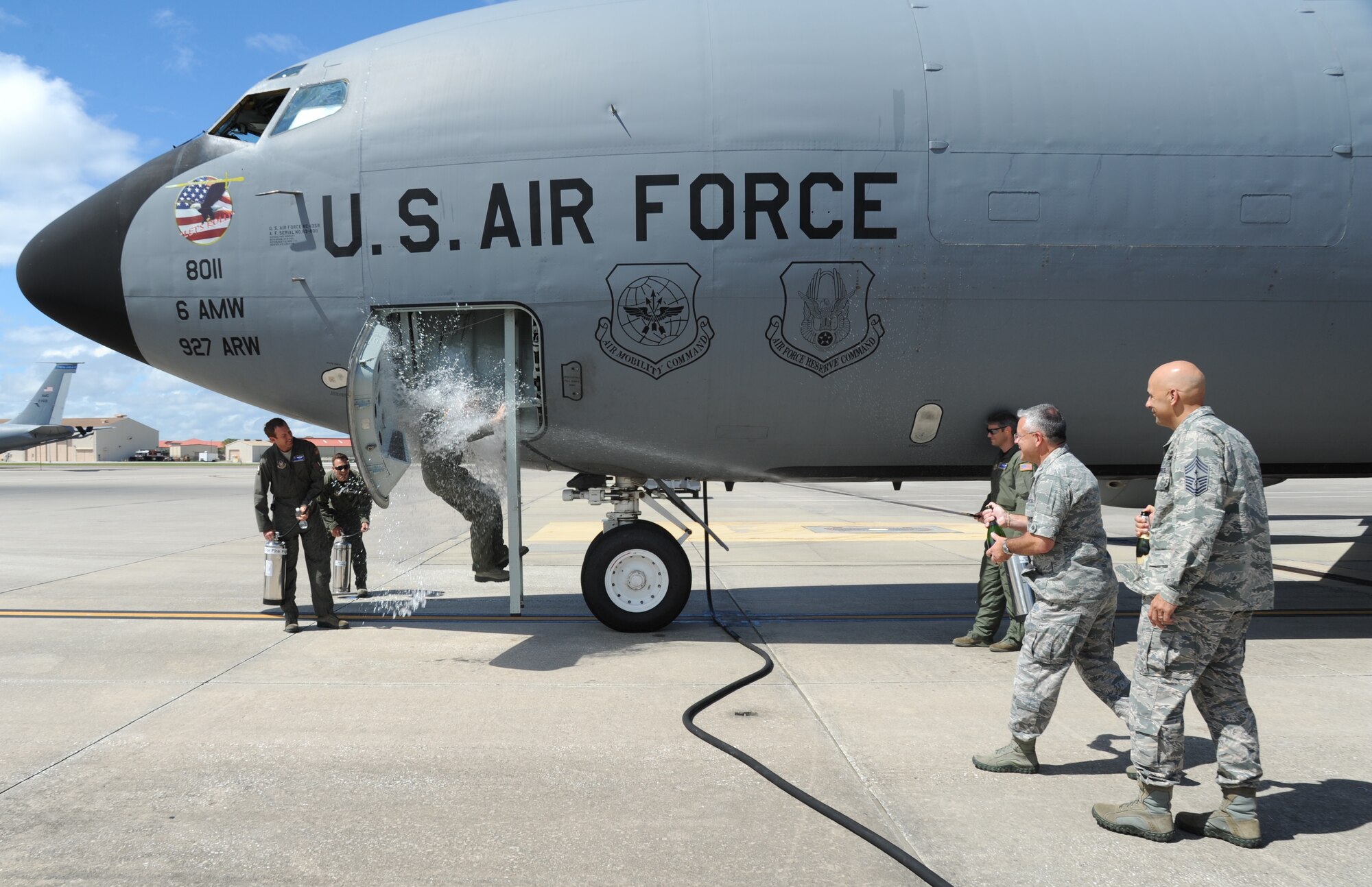 Col. Brad Anderson, took his final flight as the 927th Air Refueling Wing vice commander, Saturday, October 3, 2015. Following a tradition in which aircrew members, upon completion of their final flight with the wing, or "fini flight," are met and hosed down with water by their squadron comrades, family and friends. (U.S. Air Force Photo by Tech. Sgt. Peter Dean)
