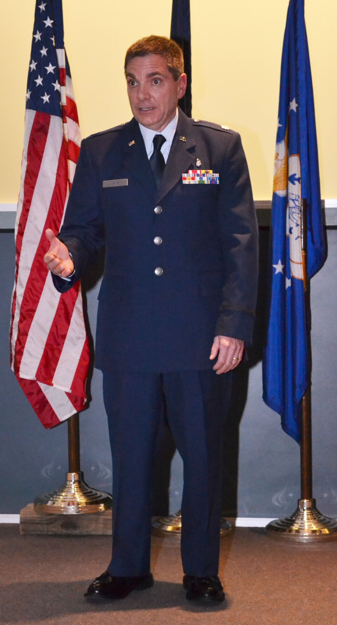 Newly-appointed 111th Medical Group Commander Lt. Col. Scott Coradi addresses his Guardsmen during a change of command ceremony Oct. 3, 2015, Horsham Air Guard Station, Pennsylvania. Coradi began in the military as an enlisted Air Force firefighter before entering into the medical field. (U.S. Air National Guard photo by Tech. Sgt. Andria Allmond/Released)