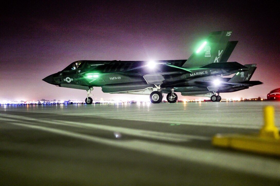 Marine Corps Majs. Colin J. Newbold and Mark A. Noble taxi in an F-35B Lightning II during Weapons and Tactics Instructor Course 1-16 on Marine Corps Air Station Yuma, Ariz., Oct. 1, 2015. Newbold and Noble are pilots. The course is a seven-week training event hosted by Marine Aviation Weapons and Tactics Squadron 1. U.S. Marine Corps photo by Chief Warrant Officer 3 Jorge A. Dimmer