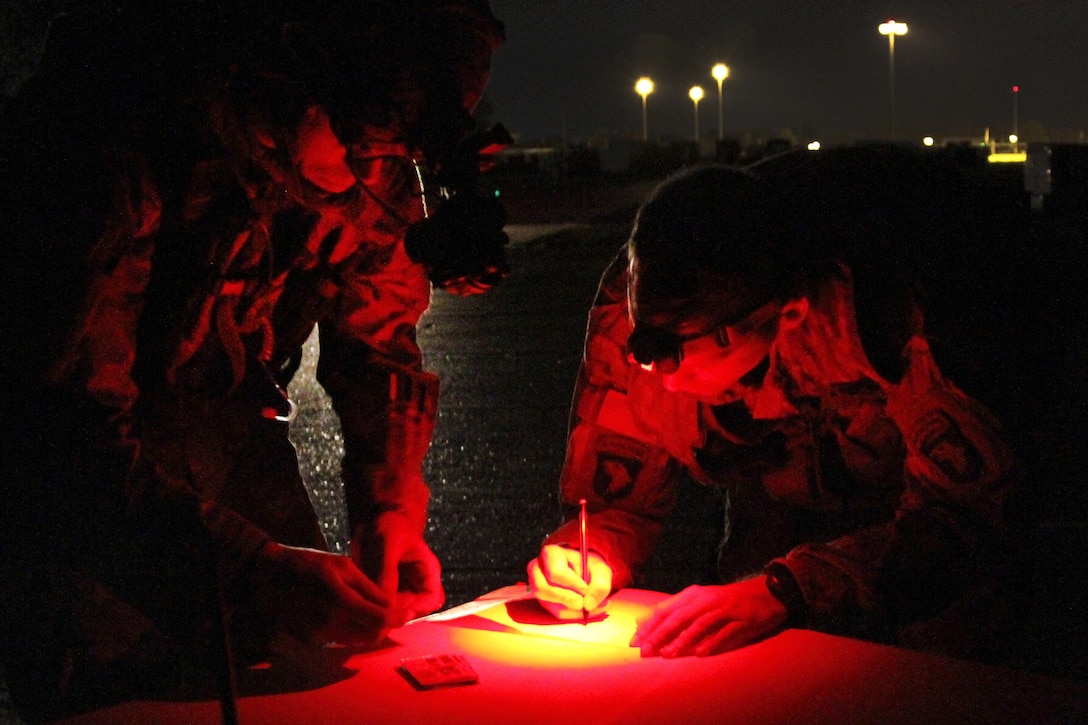 Paratroopers manifest for their aircraft as they prepare to conduct an air assault training mission at the Joint Readiness Training Center in Alexandria, La., Oct. 2, 2015. The soldiers are assigned to the 101st Airborne Division’s 2nd Battalion, 502nd Infantry Regiment, 2nd Brigade Combat Team. U.S. Army photo by Sgt. 1st Class Mary Rose Mittlesteadt