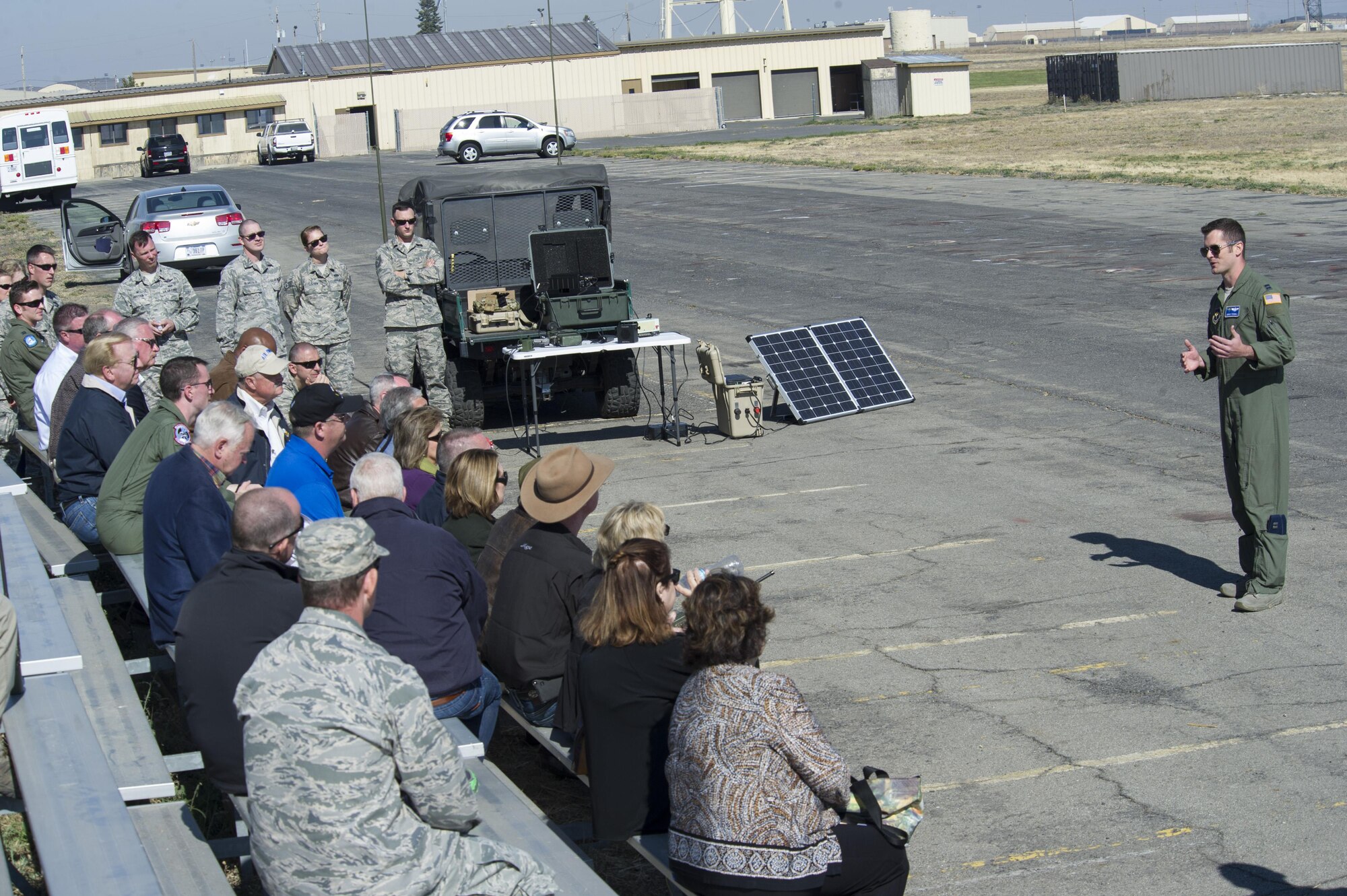 Capt. Jeremy Powell, 36th Rescue Squadron pilot, speaks to Air Education and Training Command civic leaders during a civic leader tour of the U.S. Air Force Survival School Sept. 29, 2015, at Fairchild Air Force Base, Wash. Powell shared with the AETC civic leaders an experience from his deployment, giving them a glimpse of a day in the life of being deployed. (U.S. Air Force photo/Airman 1st Class Nick J. Daniello)