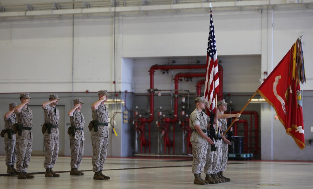 Marines with Marine Aerial Refueler Transport Squadron 252 salute Lt. Col. Claiborne Rogers, who assumed command of the squadron at Marine Corps Air Station Cherry Point, North Carolina, Oct. 1, 2015. Rogers accepted command from the outgoing commanding officer, Lt. Col. Scott M. Koltick. (U.S. Marine Corps photo by Pfc. Nicholas P. Baird/ Released)