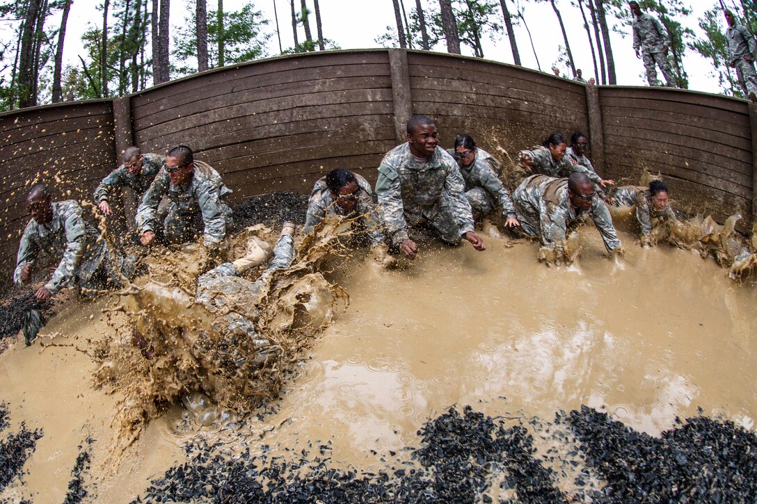 Soldiers in their second week of basic combat training participate in the final obstacle of the Fit to Win Endurance course on Fort Jackson, S.C., Oct. 1, 2015. U.S. Army photo by Sgt. 1st Class Brian Hamilton