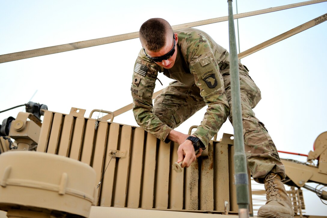 U.S. Army Spc. Walker prepares his vehicles, equipment, and weapons systems before a route clearance mission on Bagram Airfield, Afghanistan, Sept. 18, 2015. Walker is assigned to the 101st Airborne Division’s Company A, 21st Engineer Battalion. U.S. Army Photo by Sgt. 1st Class David Wheeler