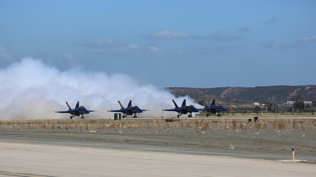 U.S. Navy Blue Angels begins their takeoff during the 2015 MCAS Miramar Air Show at Marine Corps Air Station Miramar, California, Oct. 2. Sixteen pilots volunteer to fly in the formation of F/A-18 Hornets to show audiences around the world the capabilities of the armed forces’ aircraft.
