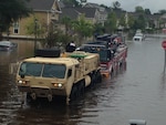 South Carolina National Guard Soldiers with the 108th Chemical Company and the 1-118th FSC assisted with the recovery of fire trucks in the Charleston, South Carolina, area during flood recovery operations Oct. 4, 2015.