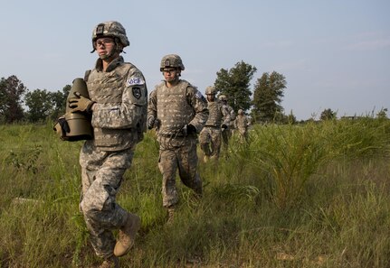 National Guard combat engineers with the 119th Engineer Company (Sapper), from West Virginia, carry a 15-pound shape charge onto a demolition range during Sapper Stakes 2015 competition at Fort Chaffe, Ark., Aug. 31. Combat engineers use demolition in mobility and counter-mobility to both allow movement to allies and impede movement for enemy forces. The competition is designed to build teamwork, enhance combat engineering skills and promote leadership among the units. (U.S. Army photo by Master Sgt. Michel Sauret)