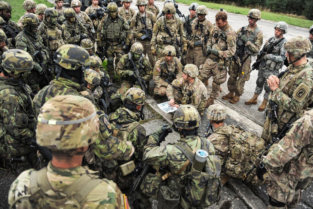 U.S. and Czech paratroopers attend a briefing before an air assault operation as part of Exercise Sky Soldier II at the Bechyne Training Area in the Czech Republic, Sept. 24, 2015. The U.S. paratroopers are assigned to the 91st Cavalry Regiment, 173rd Airborne Brigade. U.S. Army photo by Markus Rauchenberger