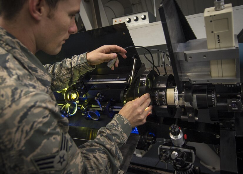 Senior Airman Samuel Davis, an airfield systems maintenance apprentice with the Detachment 2, 2nd Weather Squadron, reinstalls a solar telescope’s polaroid servo after repairing it at the Holloman Solar Observatory on Holloman Air Force Base, N.M., on Sept. 24, 2015. The observatory monitors solar activity and reports their findings to various agencies that disperse gathered information in order to facilitate protective and safeguard measures as well as research and forecasting initiatives. (U.S. Air Force photo/Senior Airman Aaron Montoya)