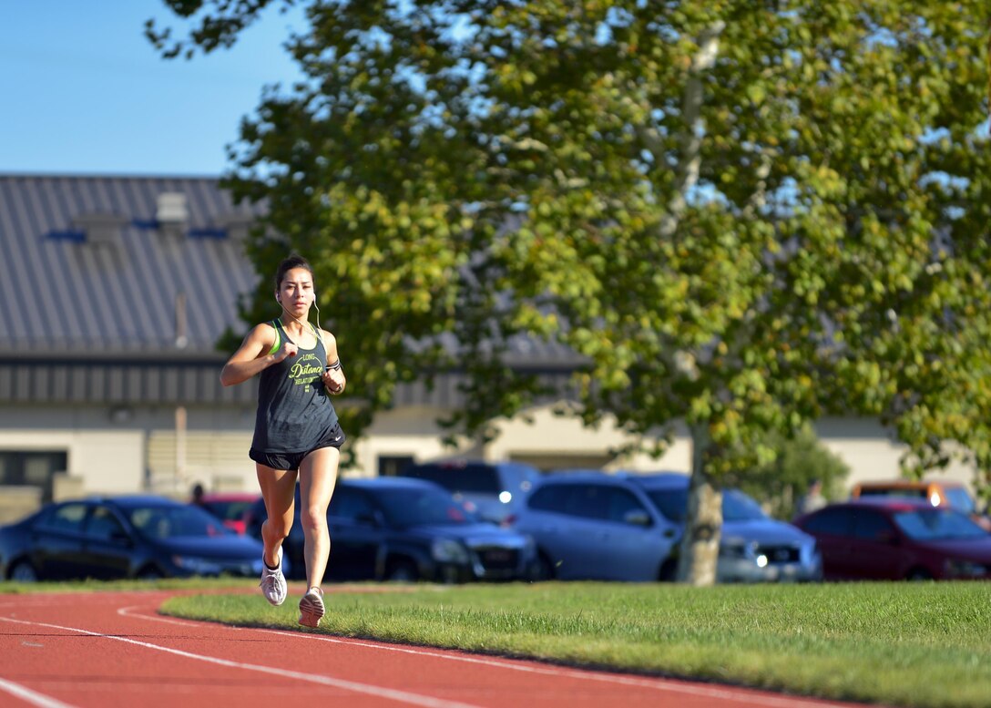 Air Force Airman 1st Class Jessica Rodriguez, an air traffic control apprentice with the 436th Operations Support Squadron, trains for the 19th Air Force Half Marathon at Dover Air Force Base, Sept. 14, 2015. Rodriguez was the only Dover-based airman selected to compete in the half marathon. U.S. Air Force photo by Senior Airman William Johnson