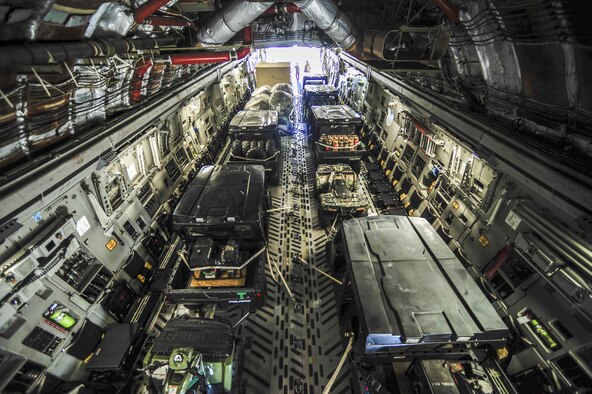 Equipment in support of U.S. Air Forces Central Command personnel recovery mission arrive on a C-17 Globemaster III assigned to Charleston Air Force Base, S.C., Sept. 28, 2015, at Diyarbakir Air Base, Turkey. The deployment of assets and personnel will enable the USAFCENT with recovery of coalition partners should they need assistance in Syria or Iraq. (U.S. Air Force photo/Airman 1st Class Cory W. Bush) 
