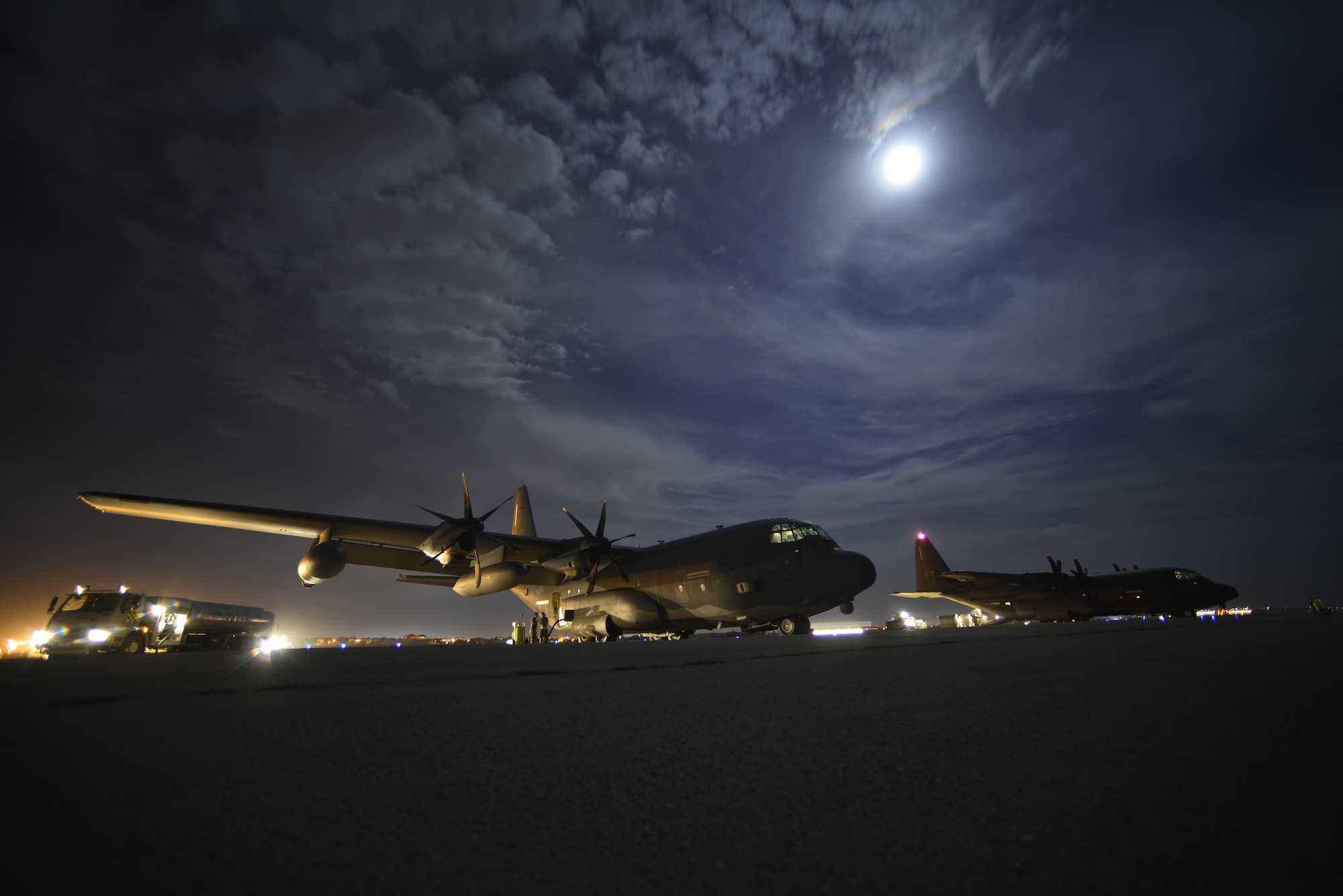 Two HC-130J Combat King IIs sit on the flight line in preparation for cargo unload at Diyarbakir Air Base, Turkey, Sept. 28, 2015. The aircraft is deployed to Diyarbakir in an effort to enhance coalition capabilities and support personnel recovery operations in Syria and Iraq. (U.S. Air Force photo/Airman 1st Class Cory W. Bush)