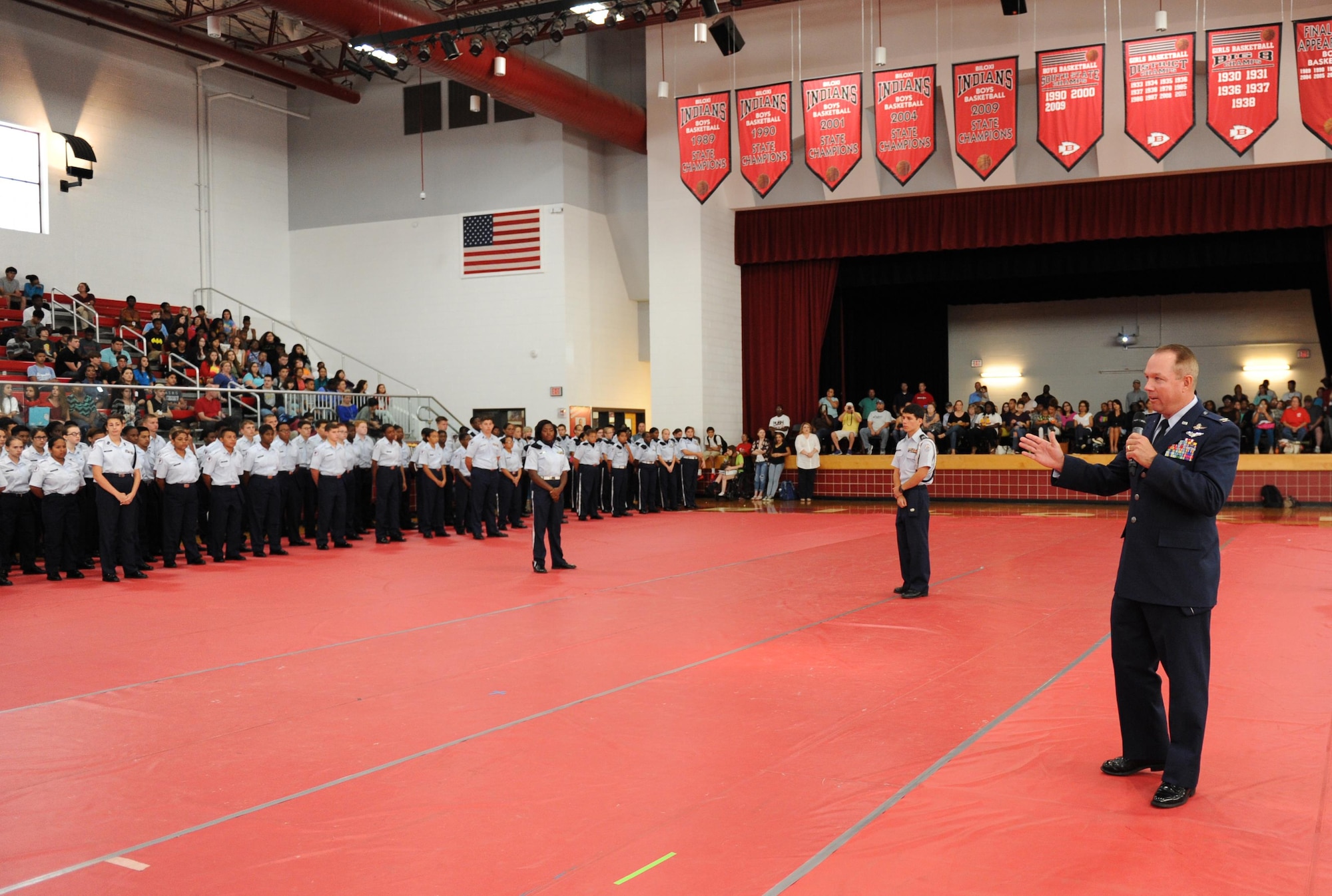 Col. Scott Solomon, 81st Training Group commander, addresses cadets and the audience during the Biloxi High School Cadet Oath ceremony at Biloxi High School, Sept. 30, 2015, Biloxi, Miss. Solomon delivered the oath to more than 100 Junior ROTC cadets. (U.S. Air Force photo by Kemberly Groue)
