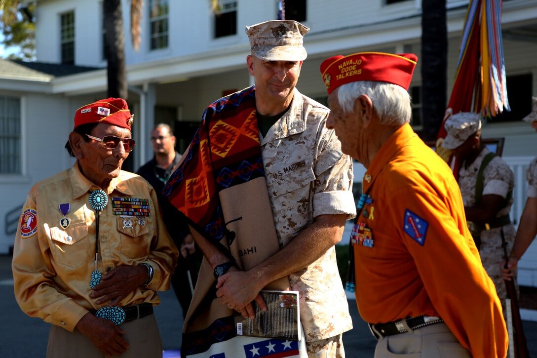 Major Gen. Daniel O’Donohue, commanding general, 1st Marine Division, pays respect to retired Navajo Code Talkers during a tour with the Navajo Nation aboard Marine Corps Base Camp Pendleton, Calif., Sept. 28, 2015. Navajo Code Talkers were first put into action during World War II in early 1942 to establish an undecipherable code which could be used in combat environments to communicate sensitive information. (U.S. Marine Corps photo by Cpl. Demetrius Morgan/RELEASED)