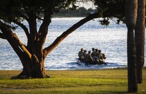 Special forces members demonstrate a rescue mission during the honorary commanders change of command ceremony on Hurlburt Field, Fla., Sept. 25, 2015. The honorary commander program allows local community leaders frequent opportunities to visit Hurlburt Field and learn about the mission, participate in base functions and to express their views on issues of mutual concern. (U.S. Air Force photo by Senior Airman Meagan Schutter)