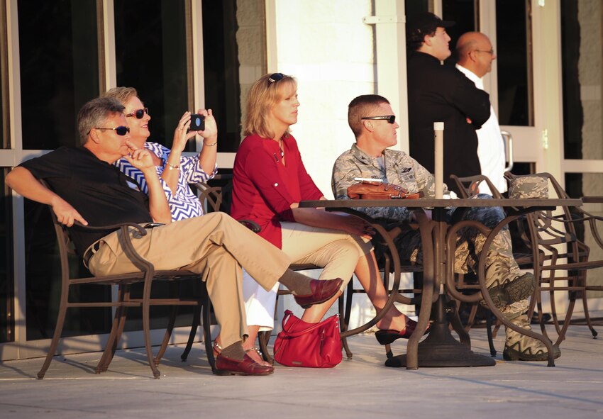Guests observe a rescue demonstration by multiple units during the honorary commanders change of command ceremony on Hurlburt Field, Fla., Sept. 25, 2015. The honorary commander program allows local community leaders frequent opportunities to visit Hurlburt Field and learn about the mission, participate in base functions and to express their views on issues of mutual concern. (U.S. Air Force photo by Senior Airman Meagan Schutter)