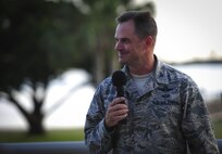 Col. Sean Farrell, 1st Special Operations Wing commander, speaks to guests during the honorary commanders change of command ceremony at Hurlburt Field, Fla., Sept. 25, 2015. The honorary commander program allows local community leaders frequent opportunities to visit Hurlburt Field and learn about the mission, participate in base functions and to express their views on issues of mutual concern. (U.S. Air Force photo by Senior Airman Meagan Schutter)