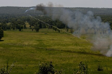 U.S. Army Reserve Soldiers with the 364th Engineer Company (Sapper) fired two inert M58 Mine Clearing Line Charges, rocket-projected line charges usually used to clear mines, during River Assault at Fort Chaffee, Ark., July 29. (U.S. Army photo by Staff Sgt. Debralee Best)