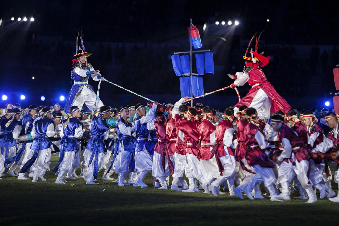 South Korean traditional dancers perform for athletes of over 100 nations who joined together for the opening ceremony of the 2015 6th Conseil International du Sport Militaire (CISM) World Games in Mungyeong, South Korea, Oct. 2, 2015. U.S. Marine Corps photo by Cpl. Jordan Gilbert