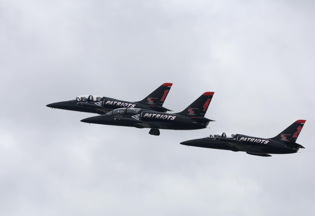 Members of the Patriots L-39 Jet Team soar over the flight line during their performance at the 2015 MCAS Miramar Air Show aboard Marine Corps Air Station Miramar, Calif., Oct. 4. The Patriots L-39s have impressed spectators with fast-paced formation flying and their signature “Tail Slide” maneuver where the aircraft actually slides backwards toward the ground, something you will not see from any other jet demonstration team.(U.S. photo by Sgt. Michele Hunt/Released)