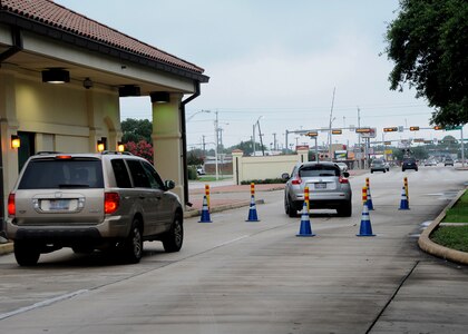 Joint Base San Antonio-Randolph members slow their vehicle speed as they exit the base through the main gate bollards June 22, at Joint Base San Antonio-Randolph.  The bollards are used for security measures and traffic control.  (U. S. Air Force photo by Melissa Peterson)