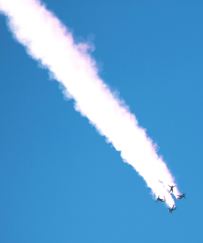 The Army’s Golden Knights parachute team performs during the 2015 MCAS Miramar Air Show aboard Marine Corps Air Station Miramar, Calif., Oct. 2. The demonstration team jumps from more than 12,000 feet onto a target on the ground. (U.S. Marine Corps photo by Sgt. Uriel Avendano/Released)