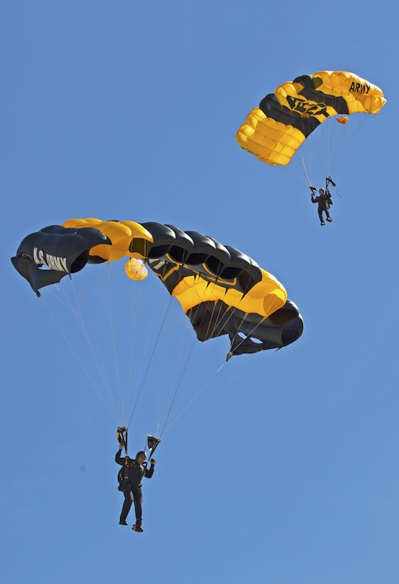 The Army’s Golden Knights parachute team performs during the 2015 MCAS Miramar Air Show aboard Marine Corps Air Station Miramar, Calif., Oct. 2. The demonstration team jumps from more than 12,000 feet onto a target on the ground. (U.S. Marine Corps photo by Sgt. Uriel Avendano/Released)