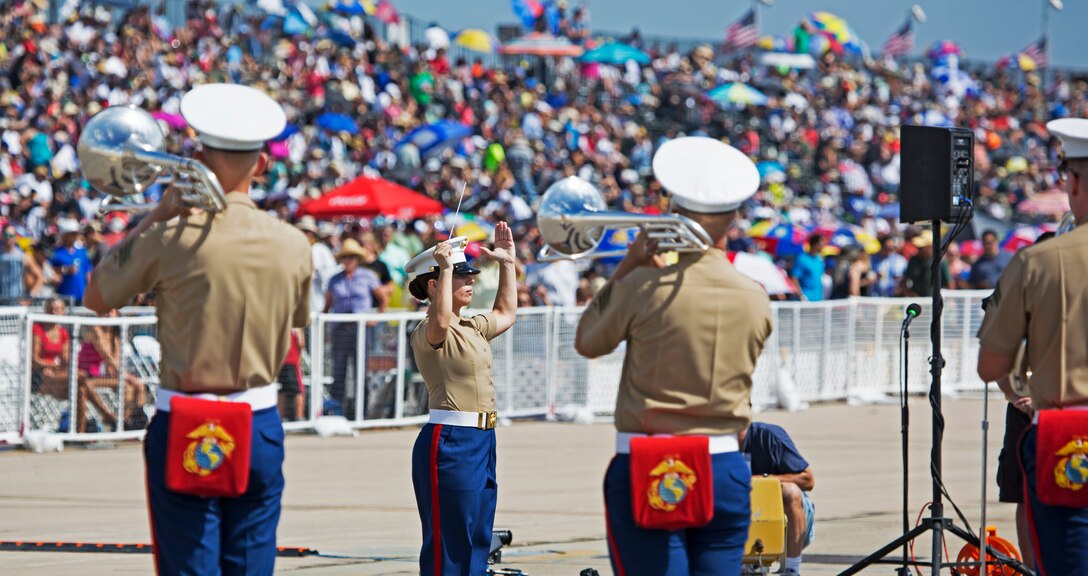 The 3rd Marine Aircraft Wing Band performs during an opening ceremony at the 2015 MCAS Miramar Air Show aboard Marine Corps Air Station Miramar, Calif., Oct. 3. Demonstrations and static displays followed the daily opening ceremonies for the world’s largest military air show. (U.S. Marine Corps photo by Sgt. Uriel Avendano/Released)