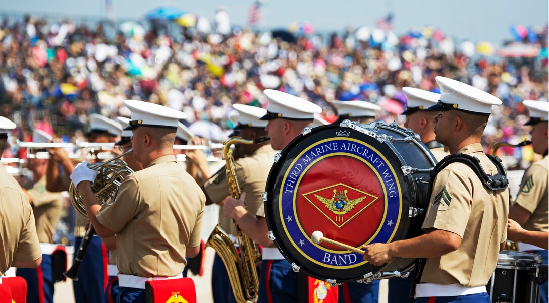 The 3rd Marine Aircraft Wing Band performs a song during an opening ceremony at the 2015 MCAS Miramar Air Show aboard Marine Corps Air Station Miramar, Calif., Oct. 3. Demonstrations and static displays followed the daily opening ceremonies for the world’s largest military air show. (U.S. Marine Corps photo by Sgt. Uriel Avendano/Released)