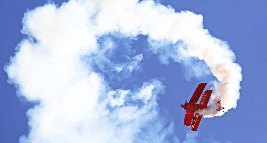 The Oracle Challenger flies over the Marine Corps Air Station Miramar, California, flight line during the 2015 MCAS Miramar Air Show, Oct. 2. The Oracle Challenger was one of many aerial performances scheduled during the air show. (U.S. Marine Corps photo by Sgt. Uriel Avendano/Released)
